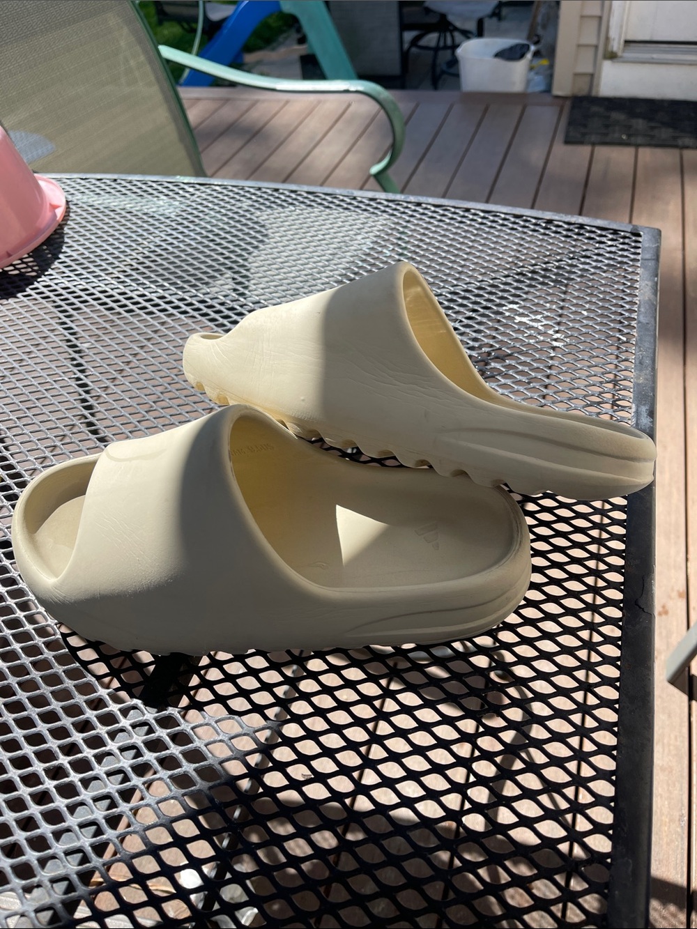 Yeezy Slide Sandals in Pale Cream
